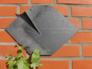 slate and brass sundial